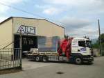 Chargement du centre d'usinage sur un de nos camion